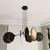 Luster na sajli MOTIF 4xE27/15W/230V crna/zlatna