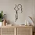 WallXpert metalni zidni ukras DCV-1005-MT, linijska ženska silueta, 50 x 20 cm, crni