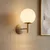 Zidna lampa AWINION 1xE27/15W/230V bež/zlatna