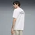 PUMA Graphic Slogan Relaxed Tee Men, Clothing, White, S
