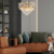 Luster na lancu LUXURIA 9xE14/40W/230V zlatni