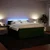 Vidaxl Box spring postelja z vzmetnico temno zelena 180x200 cm žamet