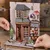 Miniaturna hiša Book Nook - Maneki Neko Corner*