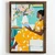 WallXpert uramljena MDF slika NAL069-70, žena u žutoj haljini čita knjigu pored vaze sa cvećem, 50 x 70 cm
