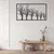 WallXpert metalni zidni ukras 5210, niz golih stabala u ramu, 75 x 42 cm, crni