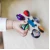 BABY EINSTEIN Senzorična igrača Curiosity Clutch ™ 3m +
