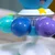 Baby Einstein Opus's Spin & Sea Sensory Octopus Toy s priseskom 3m+