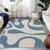 Modra pralna preproga 60x100 cm Blue Latte – Mila Home