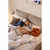 Sivorjava oblazinjena zakonska postelja s prostorom za shranjevanje z letvenim dnom 180x200 cm Thessa Pillow – Bonami Selection