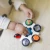BABY EINSTEIN Senzorična igrača Curiosity Clutch ™ 3m +