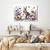 Slika zajčki na cvetočem pomladnem vrtu - 150x100