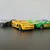 16 delni set kovinskih pisanih avtomobilčkov 1:64