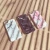 Wozinsky Marble silikonska futrola za Apple iPhone 13 - Roza KP10049