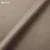 Sivorjava oblazinjena zakonska postelja s prostorom za shranjevanje z letvenim dnom 180x200 cm Anani – Makamii