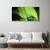 tulup.si Steklena slika Dew drops leaf 120x60 cm 4 obešalnika