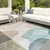 Kremno bel/turkizen pralen tekač 80x200 cm Puddle – Mila Home