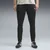 PUMA IndividualFINAL Slim Training Pants Men, Clothing, Desert Dust/White, M