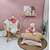 Plyšová žirafa Couleurs Savane Doudou et Compagnie červená 30 cm od 0 mes DC4074