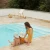 liewood® obojestranski klobuček gorm peach seashell/pale tuscany