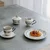 Zelena/slonokoščena porcelanasta skledica Cyril – S|P Collection