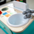 Baby Einstein Igrača Glasbena kuhinja Magic Touch Kitchen Pretend to Cook HAPE 9m+