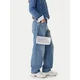 Torbica Tommy Jeans srebrna barva, AW0AW18009