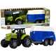 Zeleni traktor s plavom prikolicom za prijevoz konja