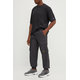 Champion Spodnji del trenirke 220415 Črna Loose Fit