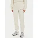 New Balance Spodnji del trenirke WP43500 Bež Relaxed Fit
