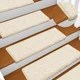 vidaXL Preproge za stopnice 10 kosov 65x25 cm bele
