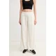 PUMA WARDROBE Essentials Low Rise Popper Pants Women, Clothing, Alpine Snow, M
