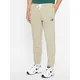 New Balance Spodnji del trenirke NB Essentials Sweatpant MP33509 Zelena Regular Fit