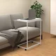 Vidaxl Stranska mizica s kolesi bela 55x35x70 cm konstruiran les