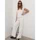 Sinsay - Straight pantalone sa viskozom od scuba materijala - krem